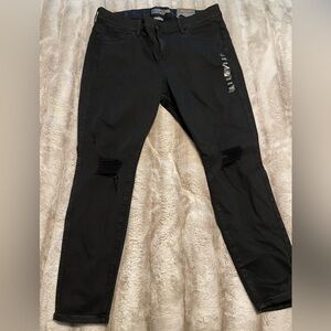 Torrid Bombshell Skinny Jeans - black. Size 22R